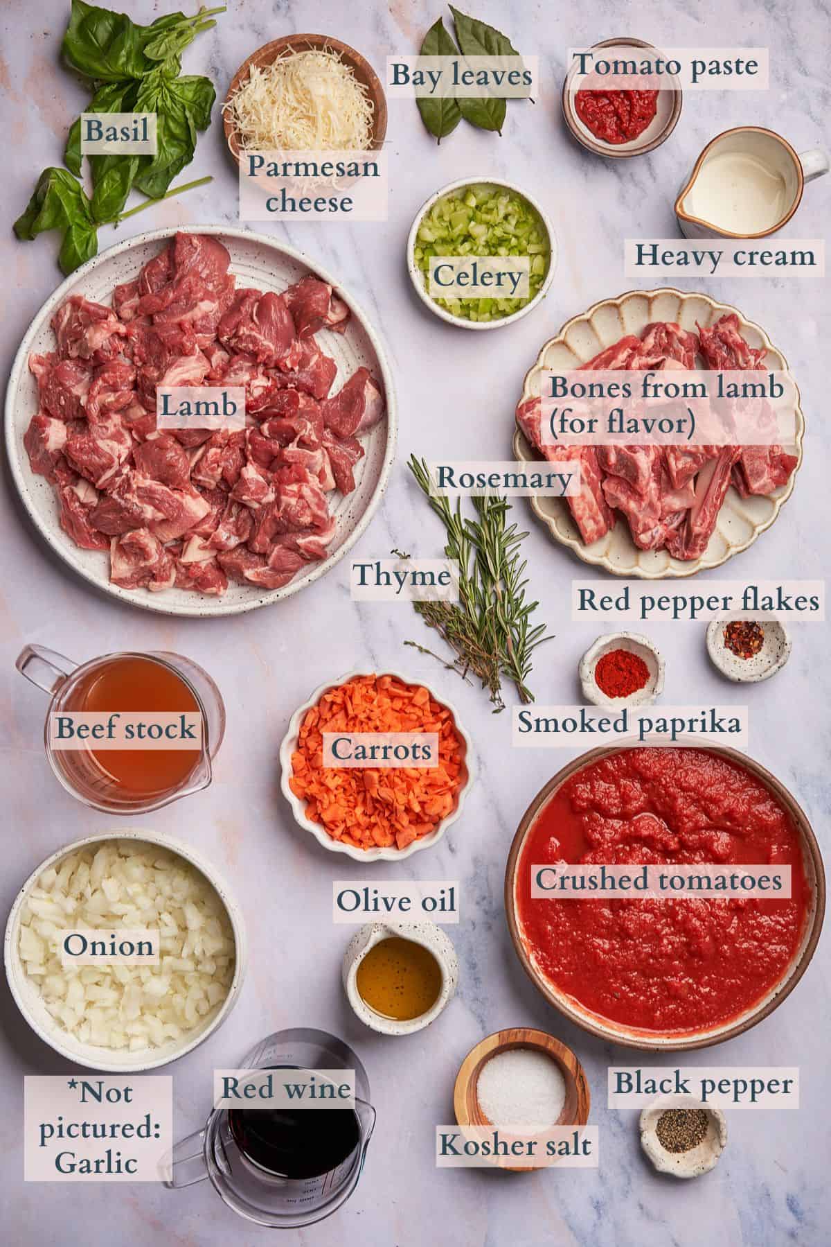 ingredients to make a lamb ragu slow cooker with text over laying to denote each ingredient. 
