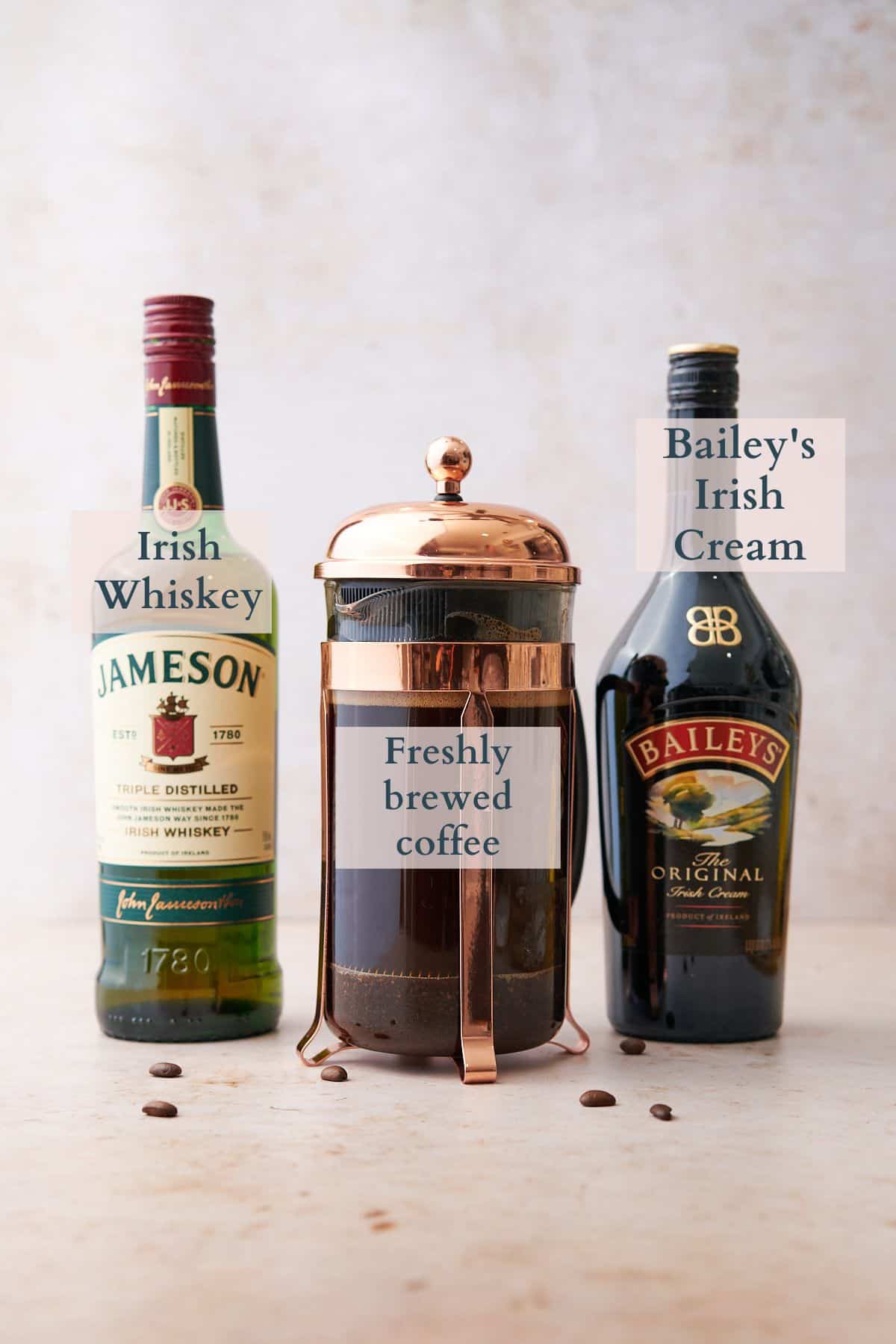 ingredients for baileys coffee recipe standing side by side together.
