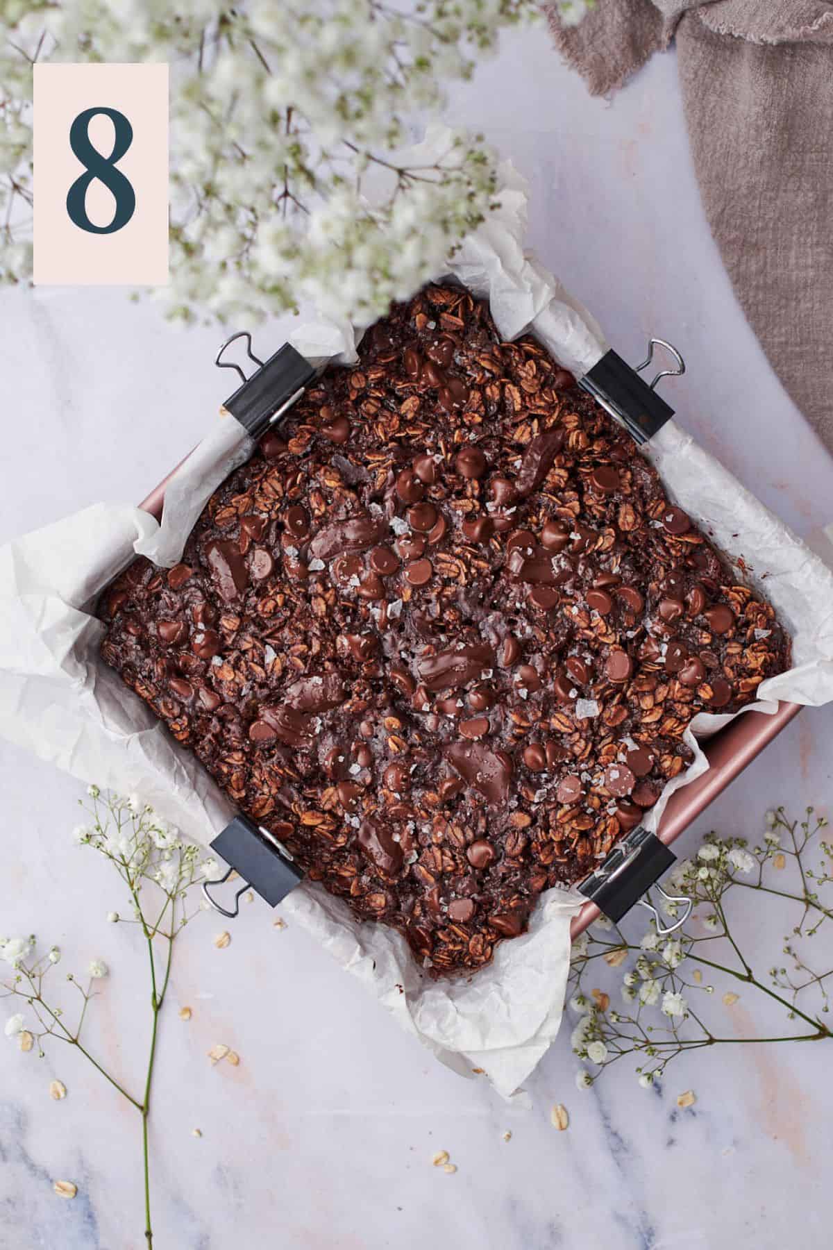 baked chocolate oats in a baking dish.