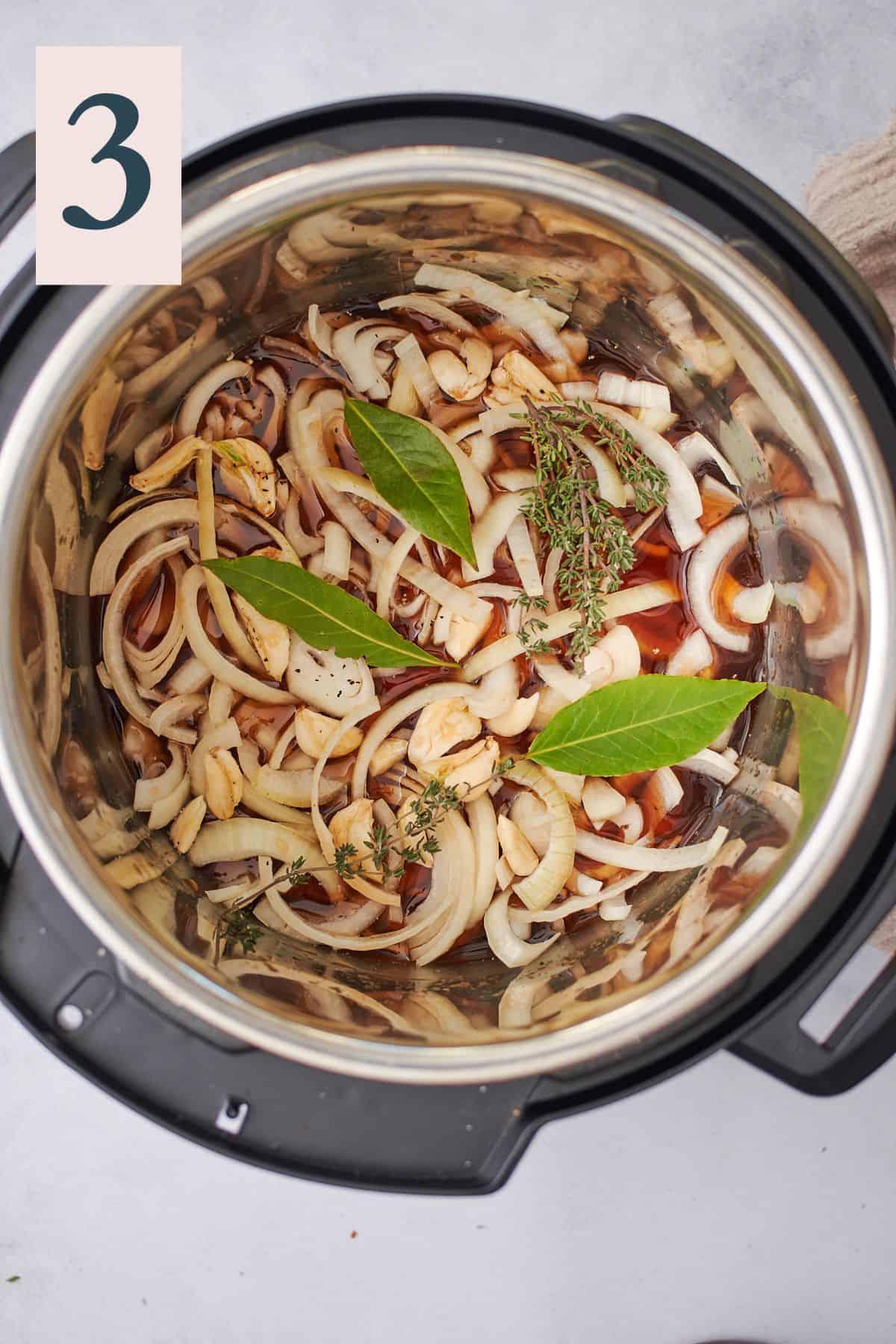 garlic, onions, beef stock, bay leaves, and fresh thyme in an Instant pot. 