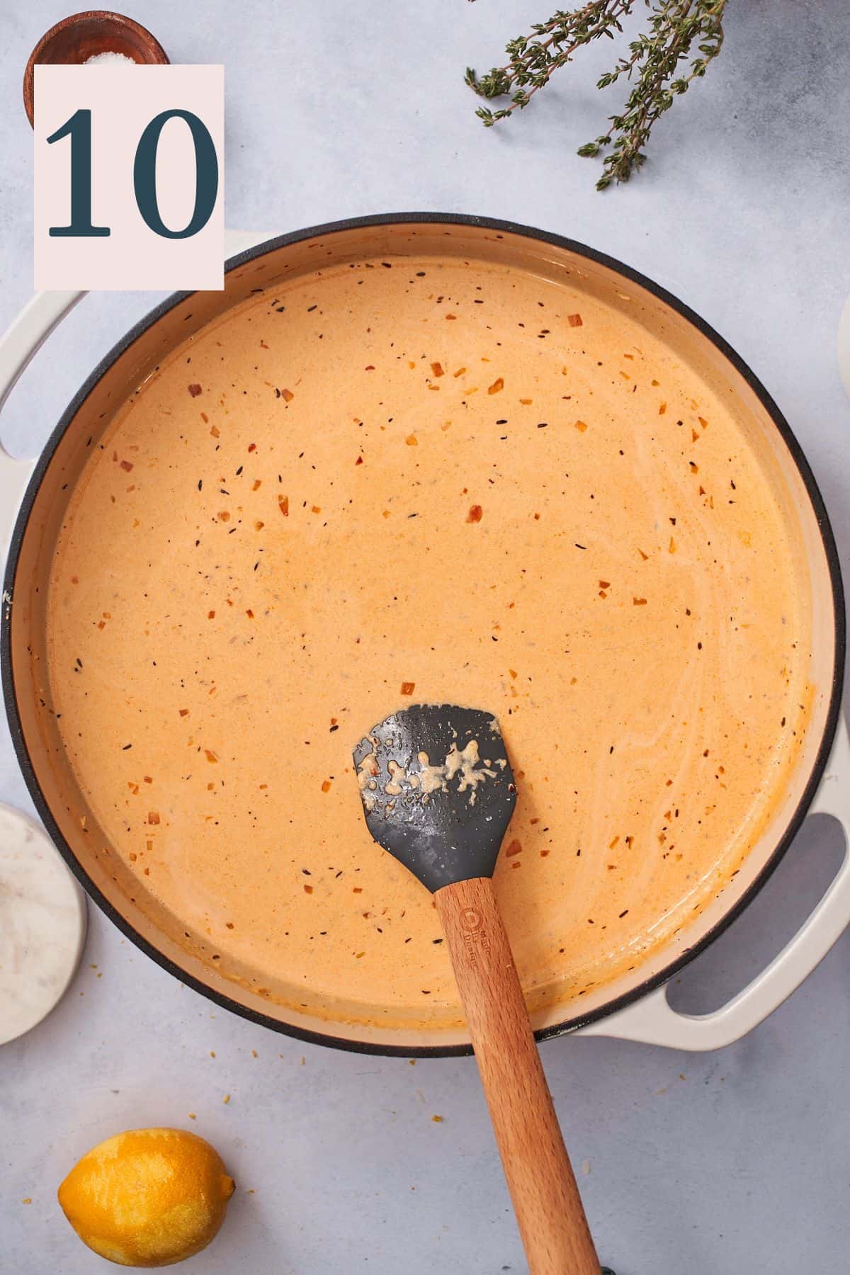creamy tomato sauce in an enameled cast iron skillet. 