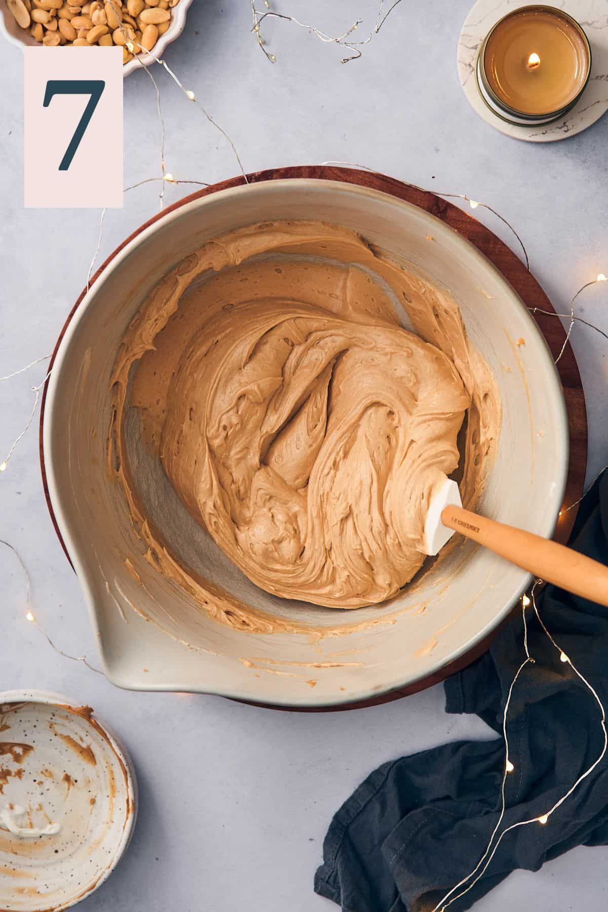 peanut butter and whipped cream smoothed together in a large mixing bowl with a rubber spatula into a decadent, creamy mixture. 