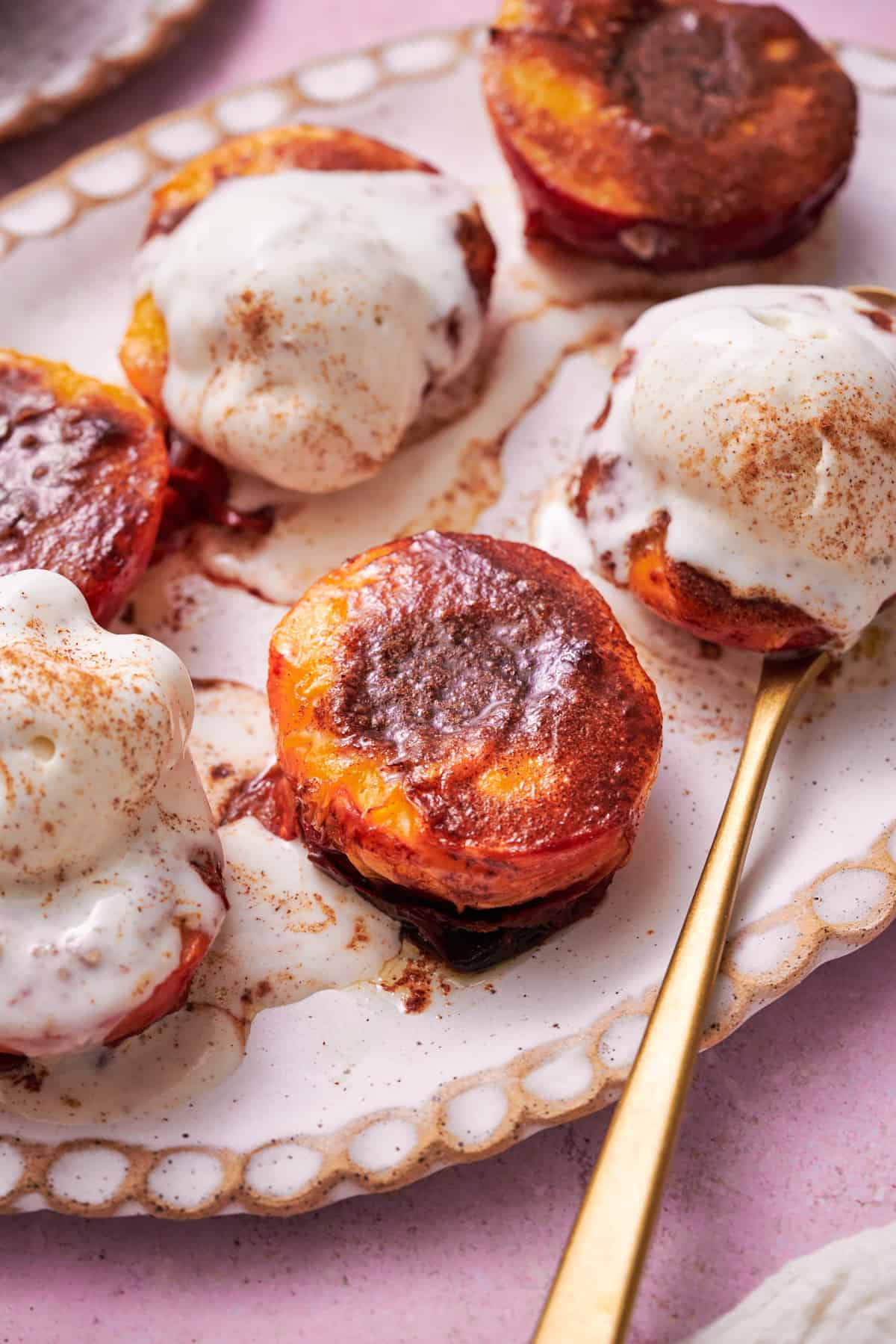air fried peaches topped with vanilla ice cream, and a brown sugar cinnamon butter. 