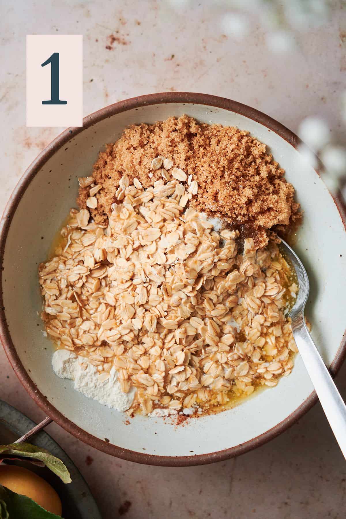 rolled oats and dry ingredients in a mixing bowl to make a crisp topping. 