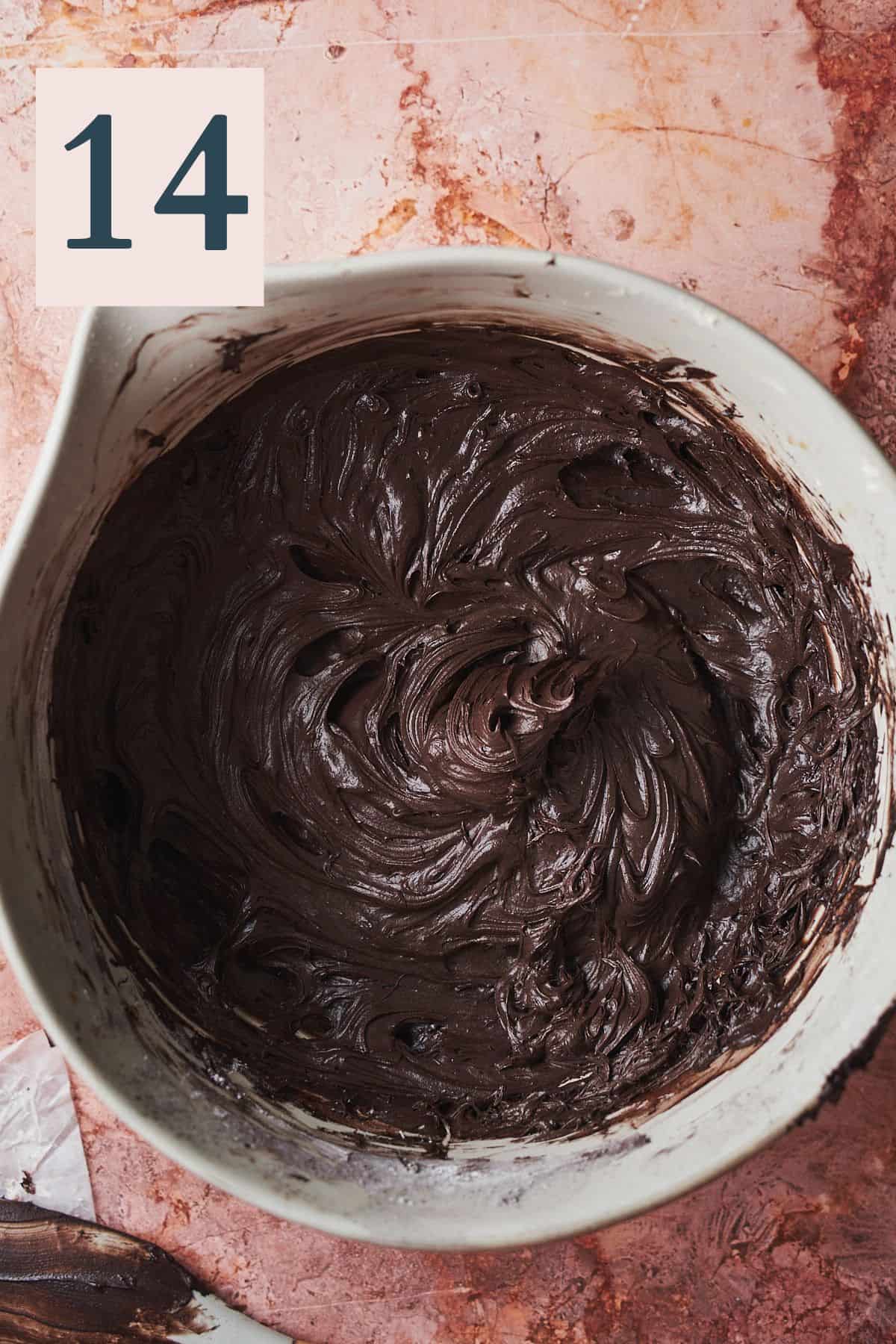 silky smooth dark chocolate cream cheese frosting in a large bowl.
