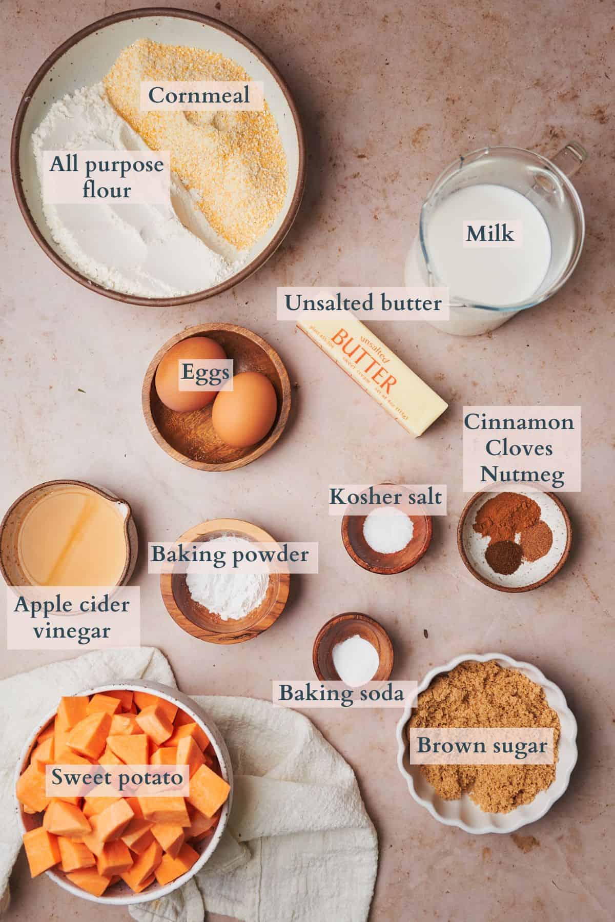 ingredients to make sweet potato cornbread labeled to denote each ingredient. 