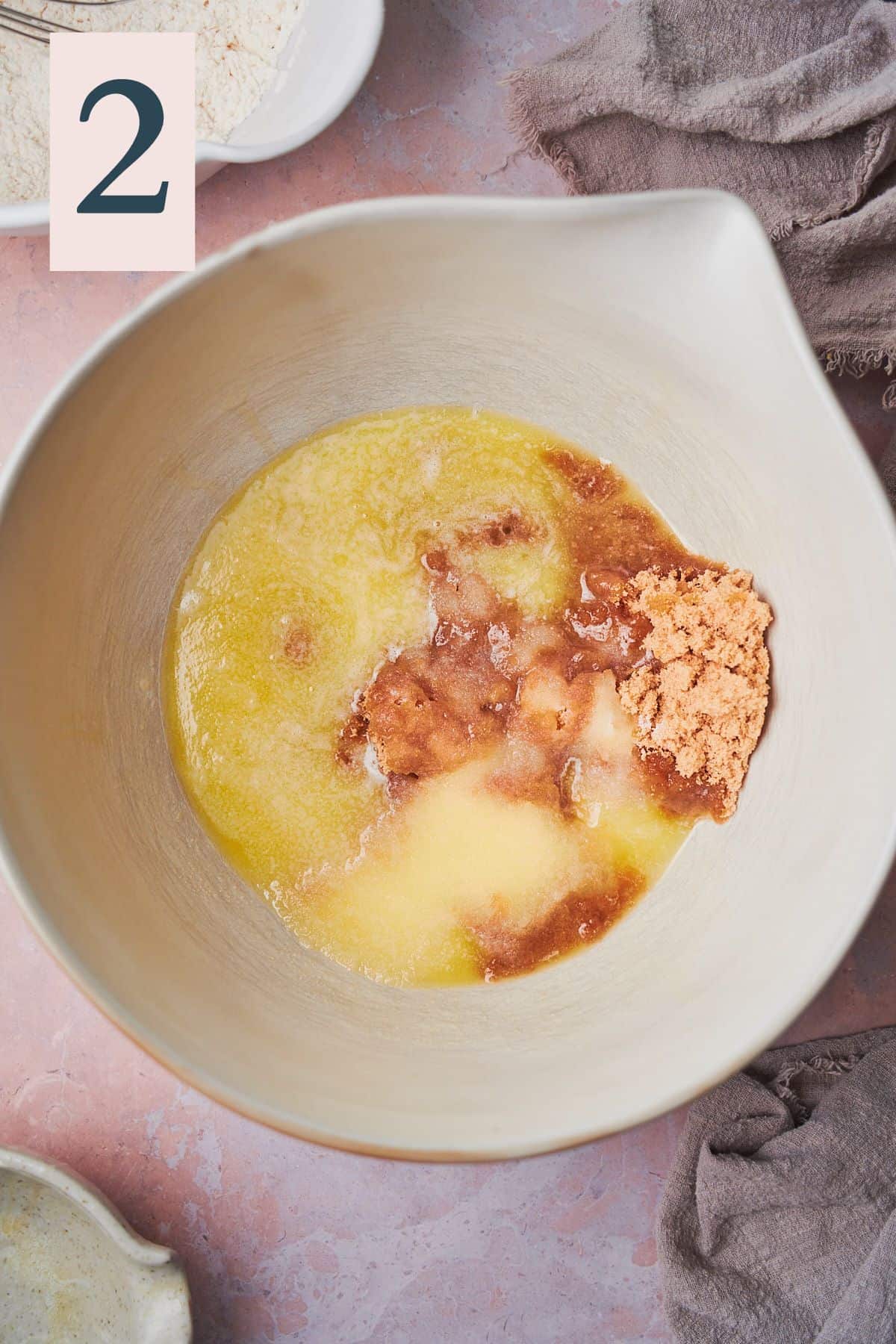 melted butter, white sugar, and brown sugar in a large mixing bowl. 