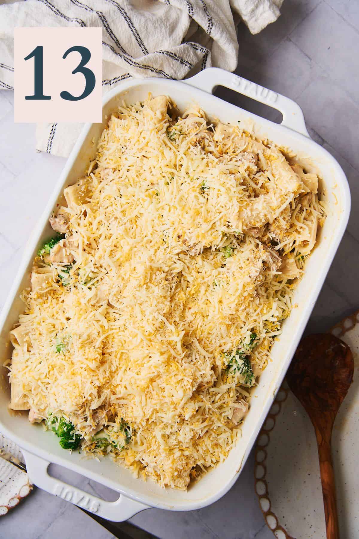 pasta bake covered with shredded cheese. 