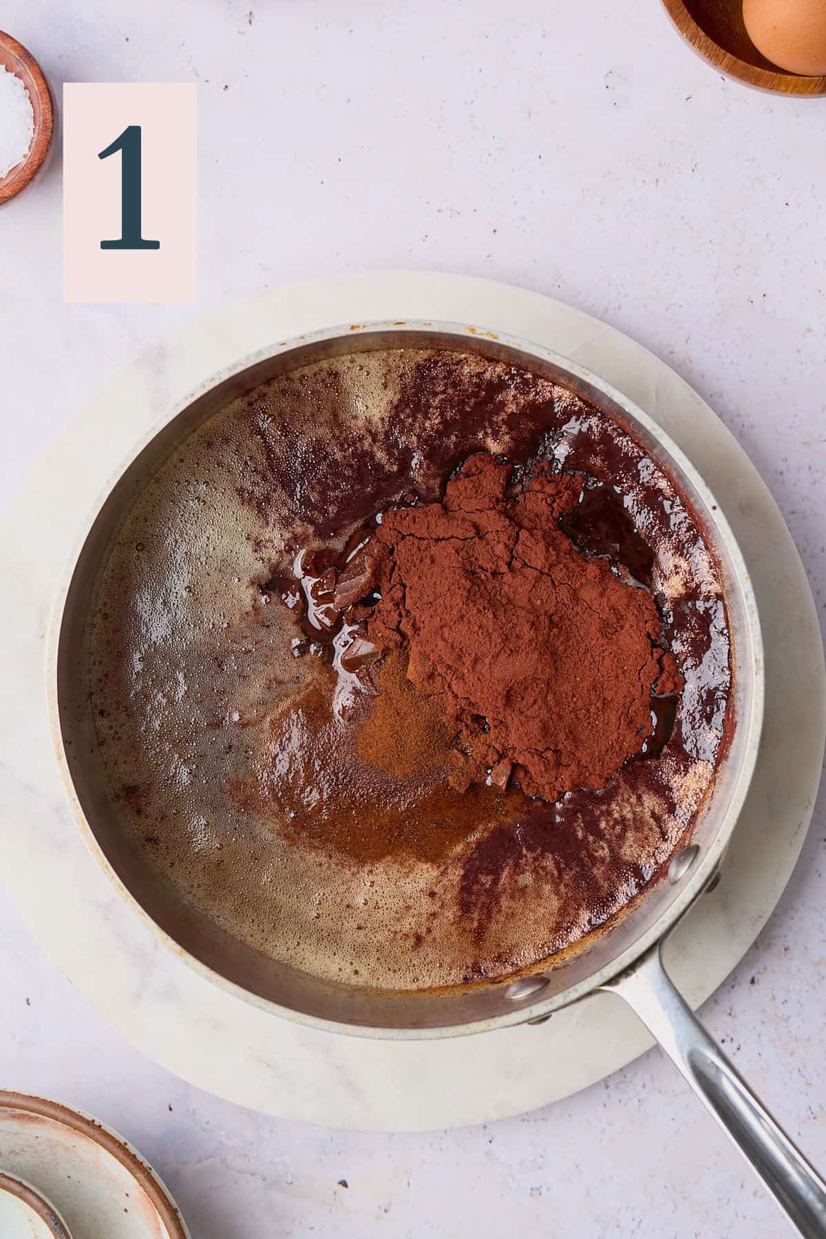 browned butter in a saucepan with chocolate, cocoa powder, and instant espresso.