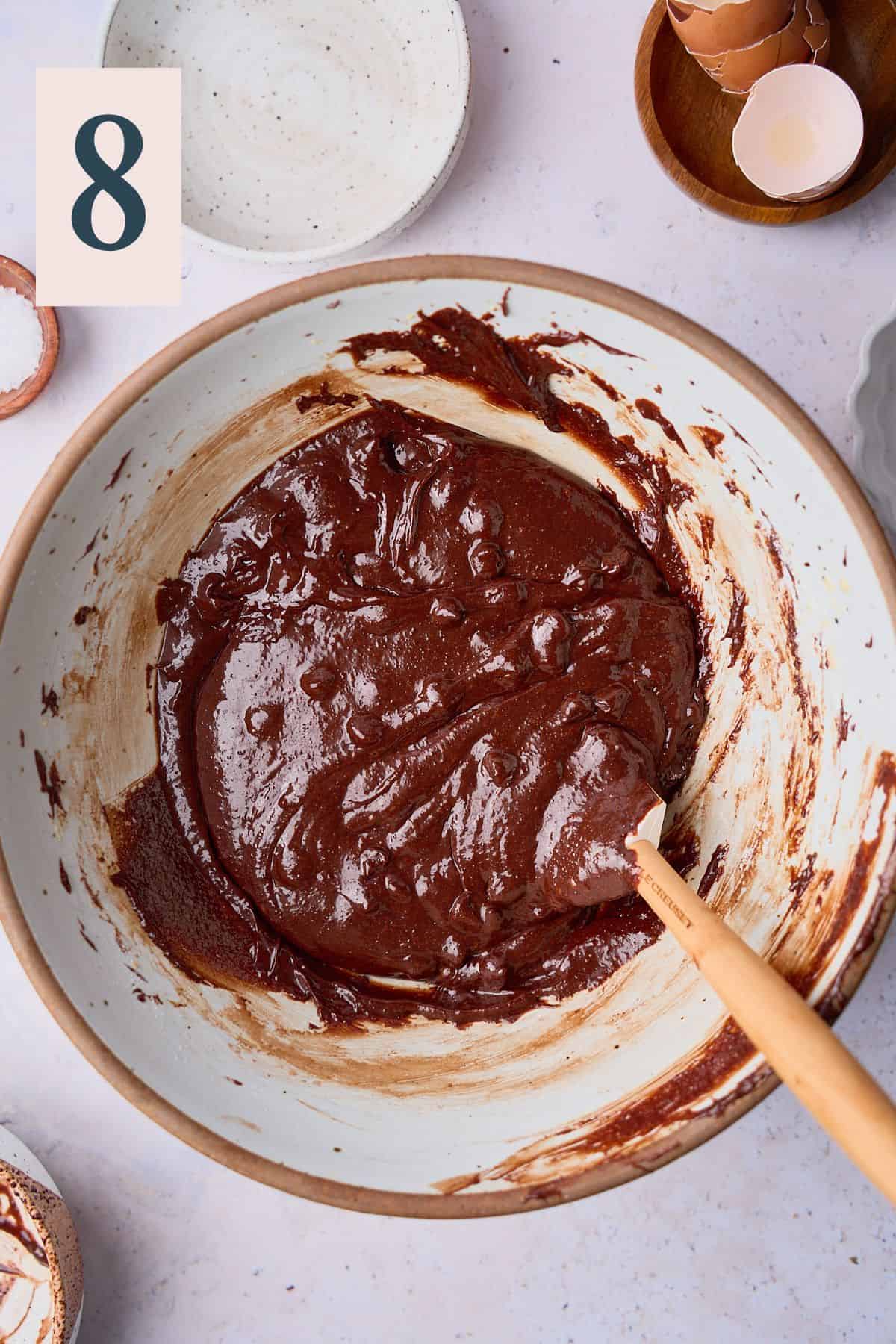 Mixed brownie batter in a bowl. 
