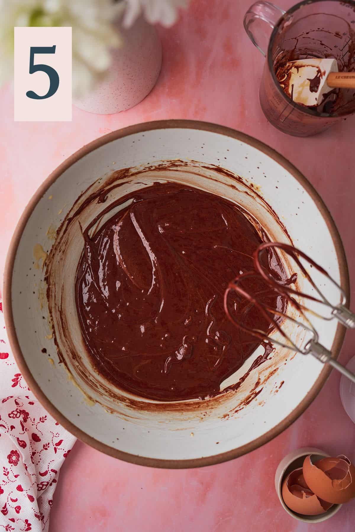chocolaty batter for brownies in a large bowl. 