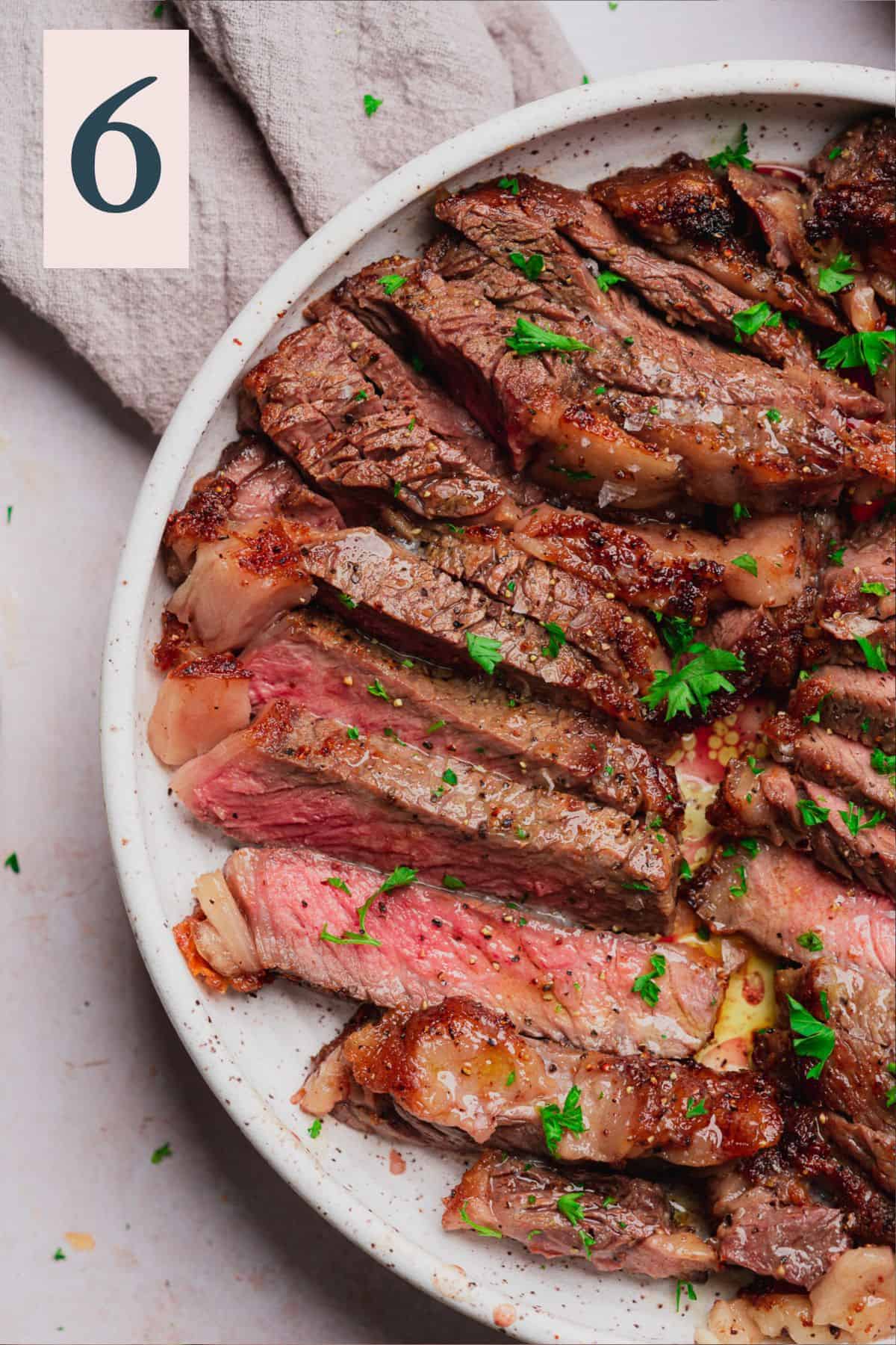 juicy medium rare air fryer ribeye steak cut into pieces
