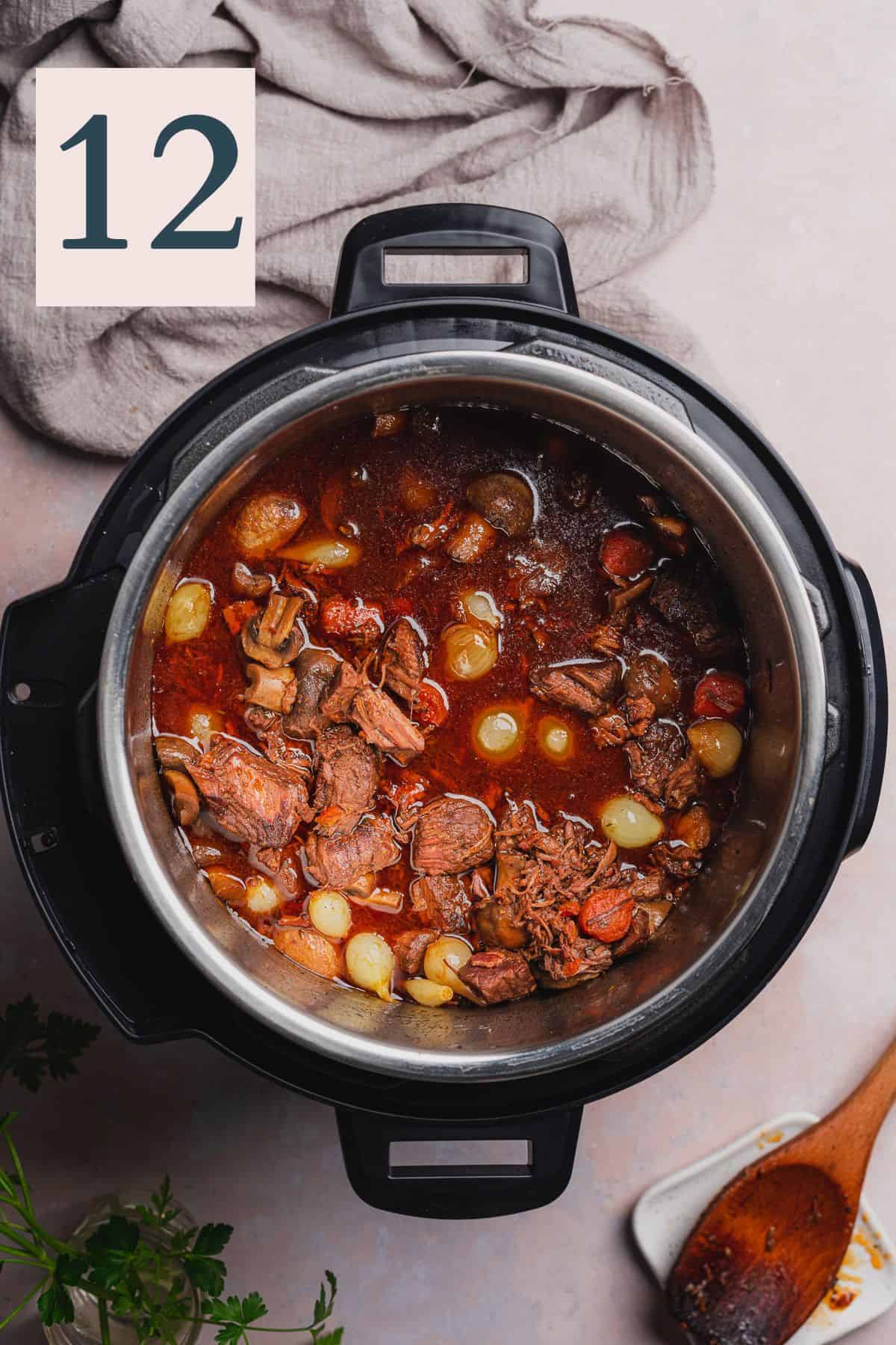 cooked beef bourguignon in a pressure cooker.