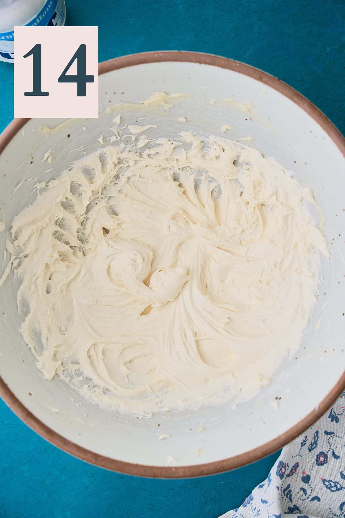 Marshmallow fluff frosting in a mixing bowl.