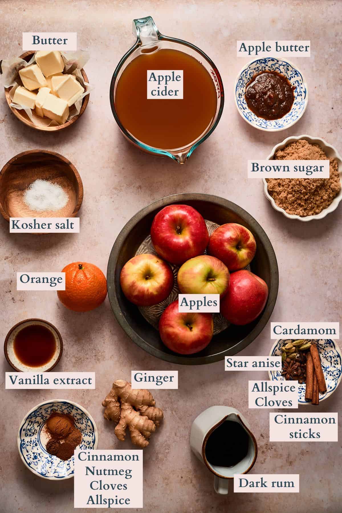 Apple cider ingredients for warm spiced apple cider drink.