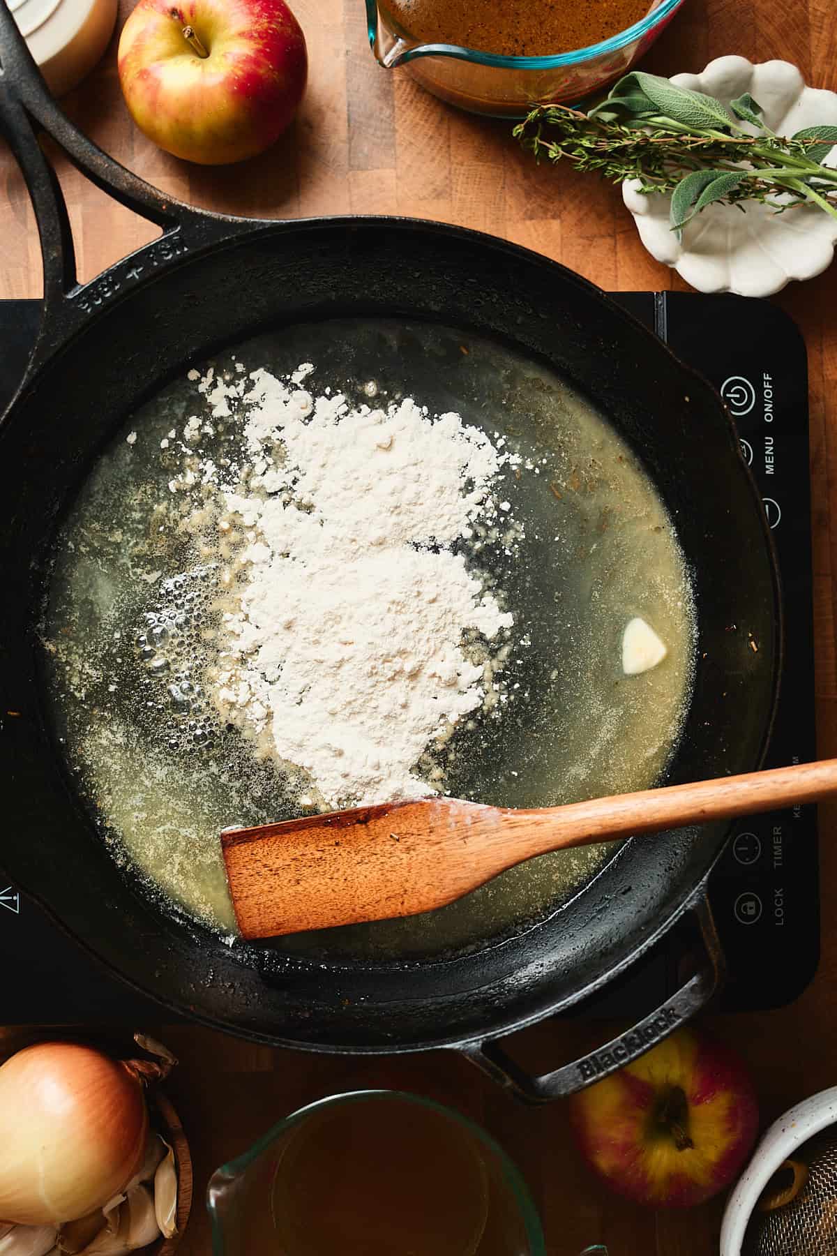 Melted butter in skillet with flour.