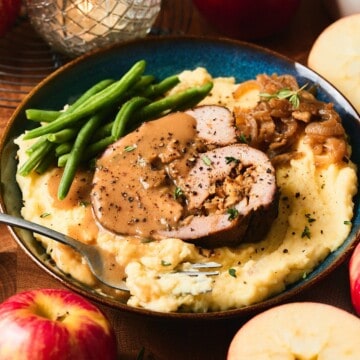Apple stuffed pork loin with apple cider gravy.