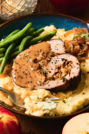 Apple stuffed pork loin with apple cider gravy.