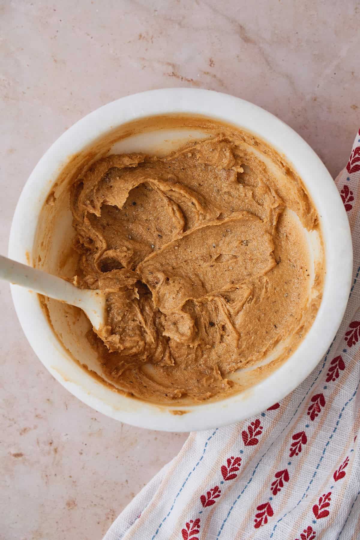 Brown sugar, cardamom, butter, in a mixing bowl to make filling for buns.