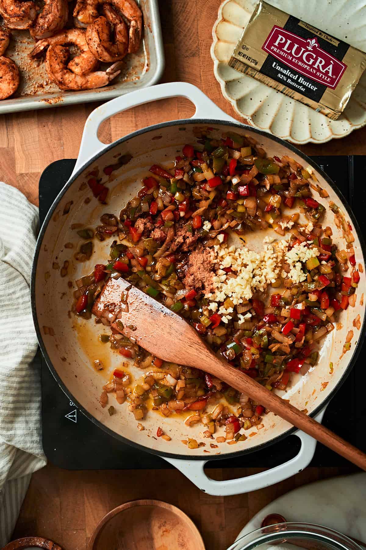 Cooked onions and peppers with garlic and seasonings added.