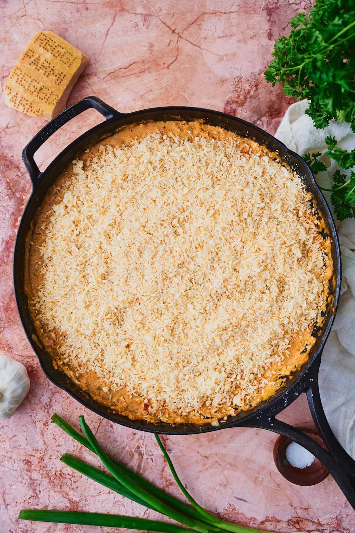 Cheesy dip topped with. crushed Ritz crackers and cheese.