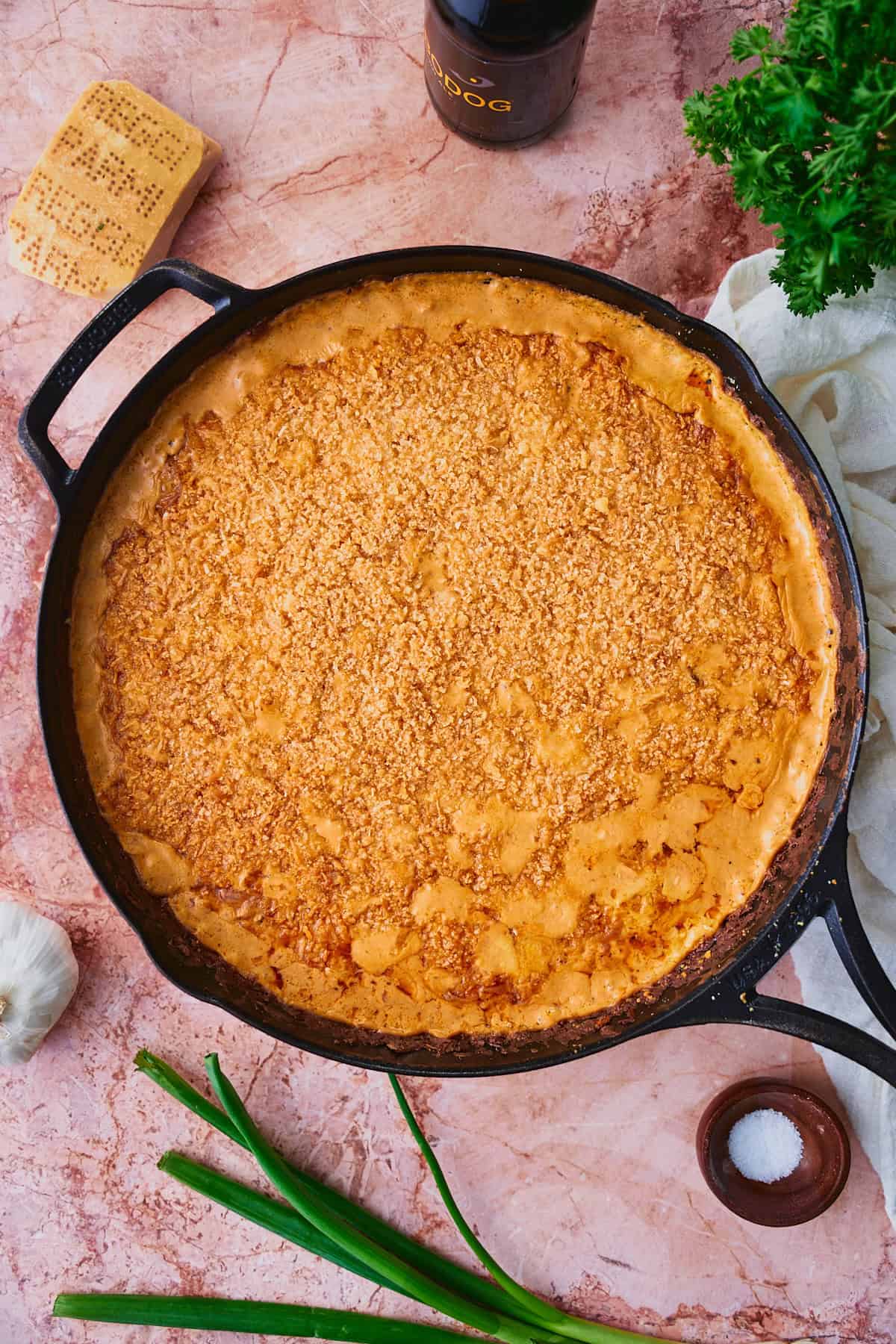 Baked hot crawfish dip with a Ritz cracker and cheese topping.