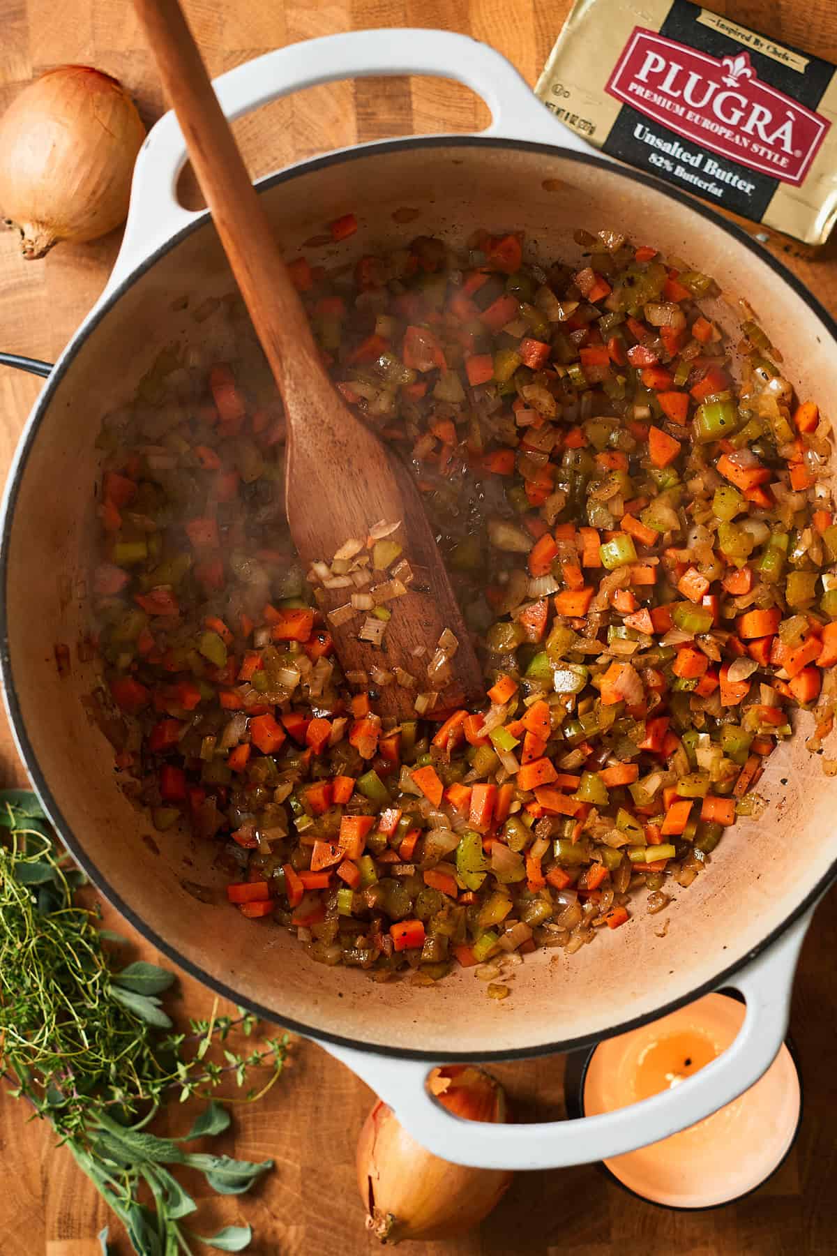 Softened carrots, onions, and celery in a large pot.
