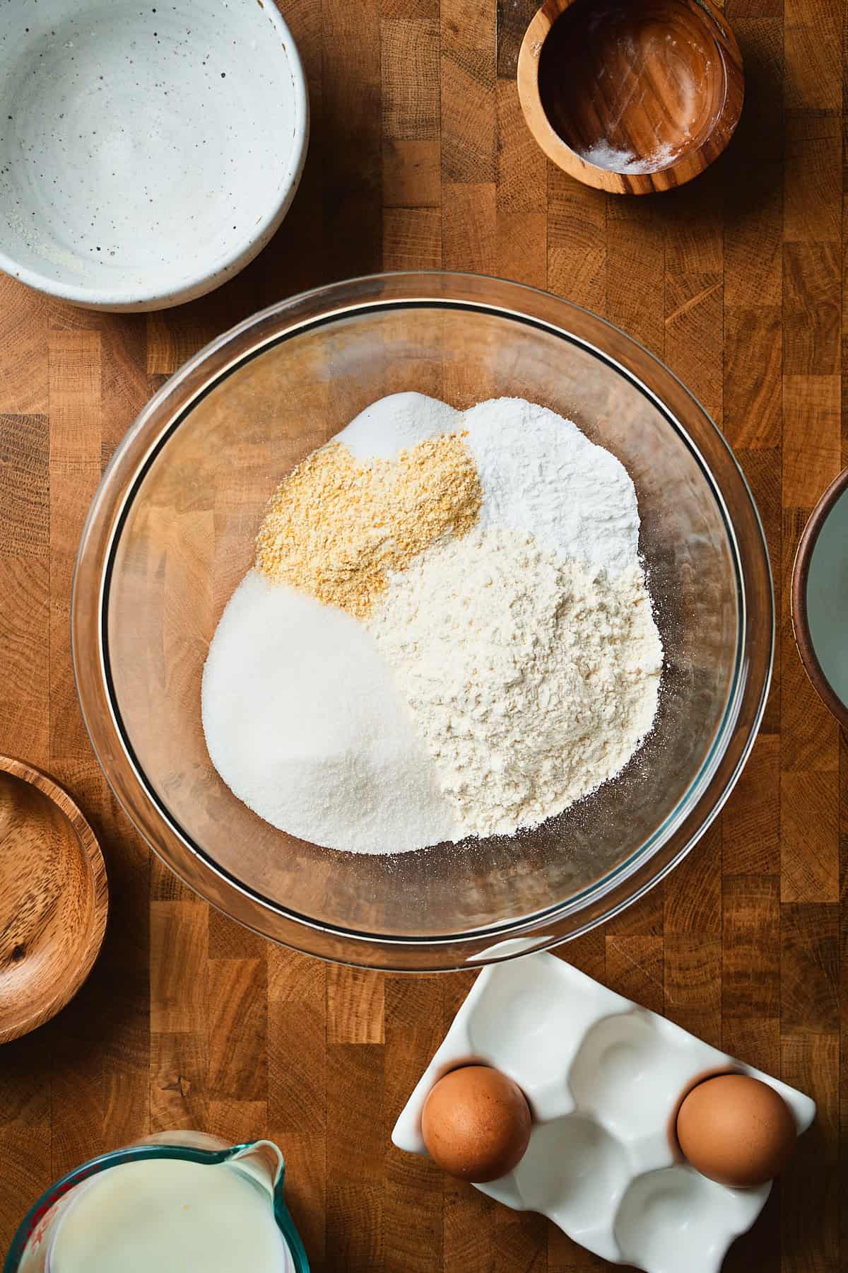 Flour, cornmeal, sugar, salt and baking powder in a mixing bowl.