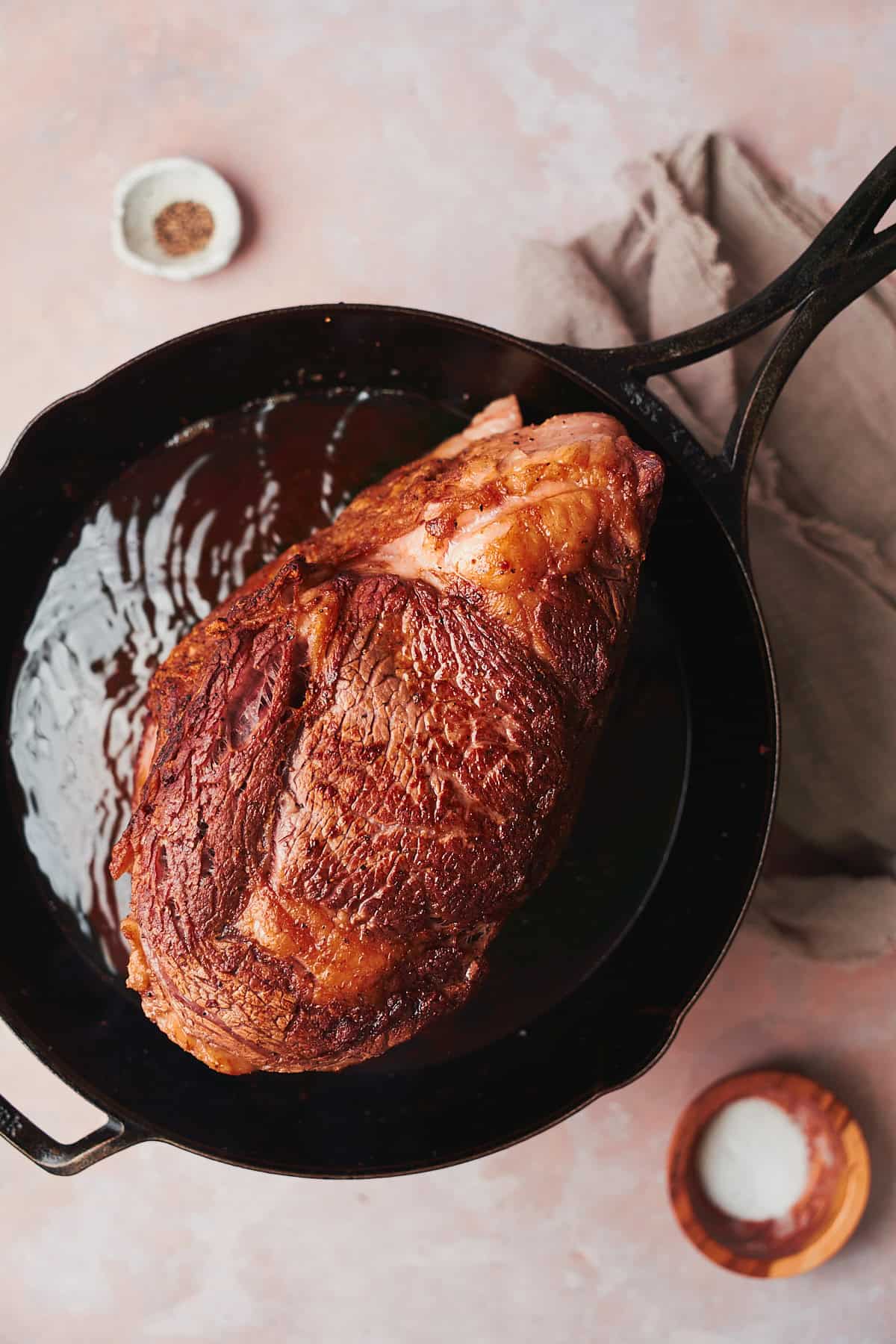 prime rib roasting in a cast iron skillet in avocado oil, getting nice and browned on all sides.