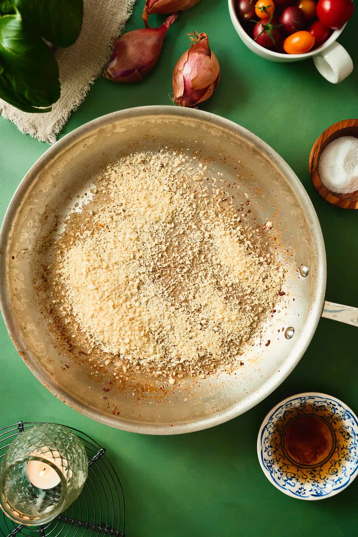 Panko breadcrumbs added to rendered beef bacon fat to toast for bacon tomato pasta.