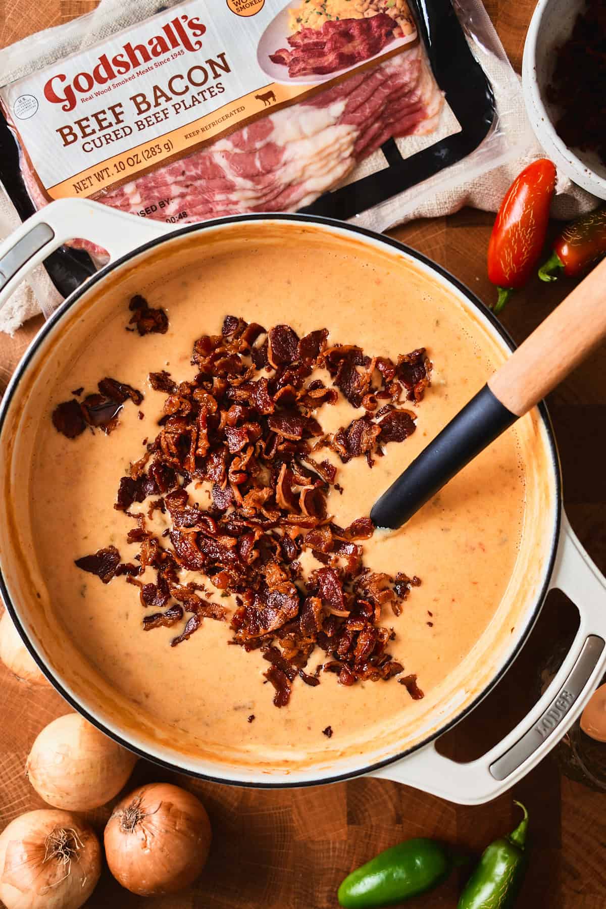 Crispy beef bacon stirred into jalapeño popper soup, with a package of Godshall's beef bacon.